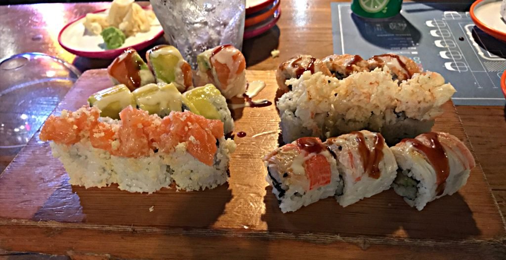 sushi on a wooden tray