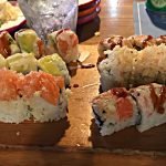 sushi on a wooden tray