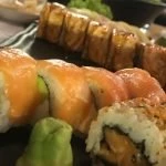 Sushi Ura Makis on a wooden plate at Saigon Lebanon