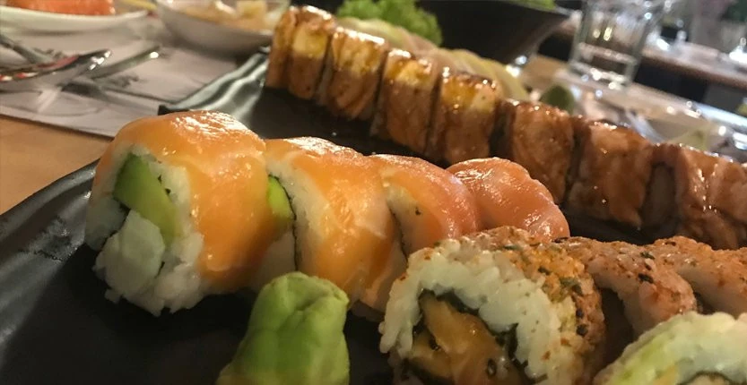 Sushi Ura Makis on a wooden plate at Saigon Lebanon