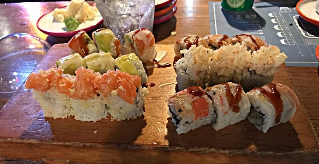 sushi on a wooden tray