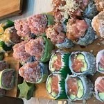 sushi on a wooden tray